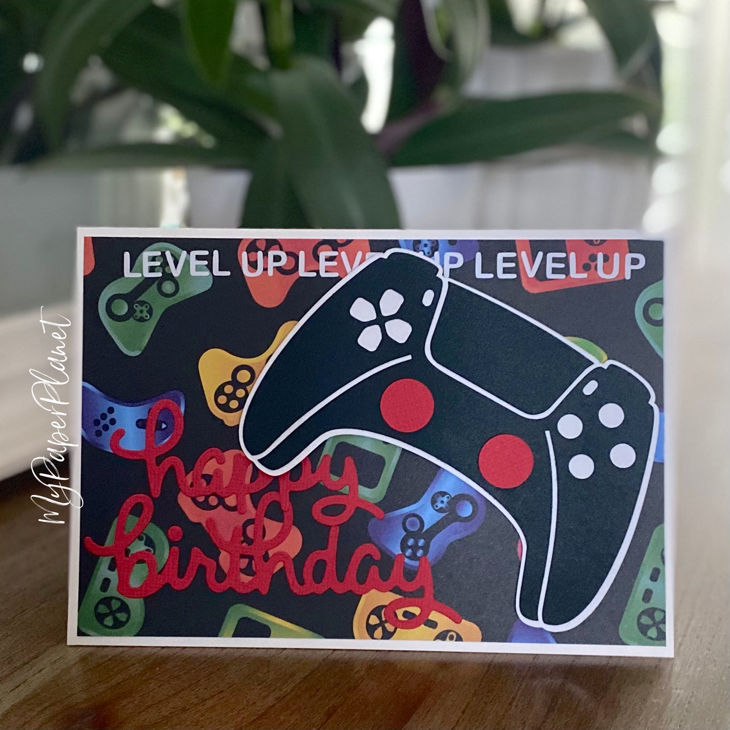 Level Up birthday card, game controller.
