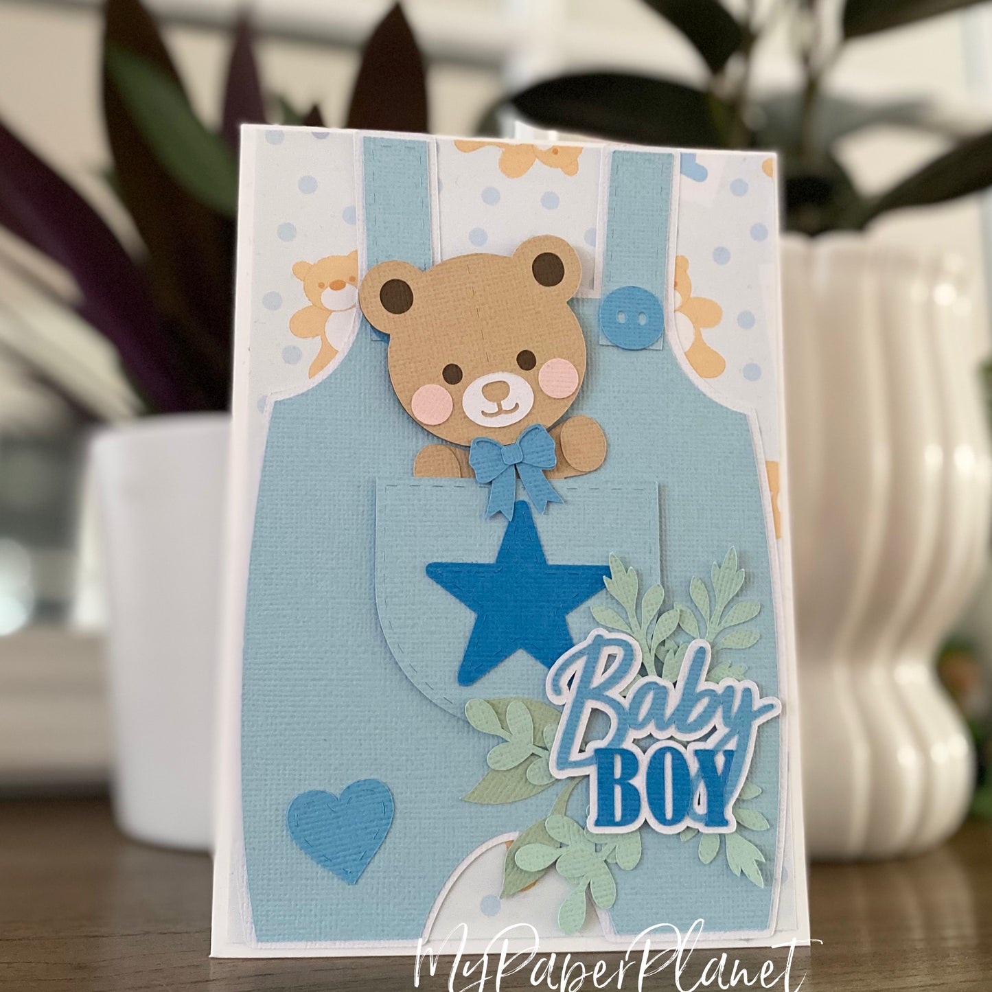 New Baby card, baby boy or girl. Baby overall.