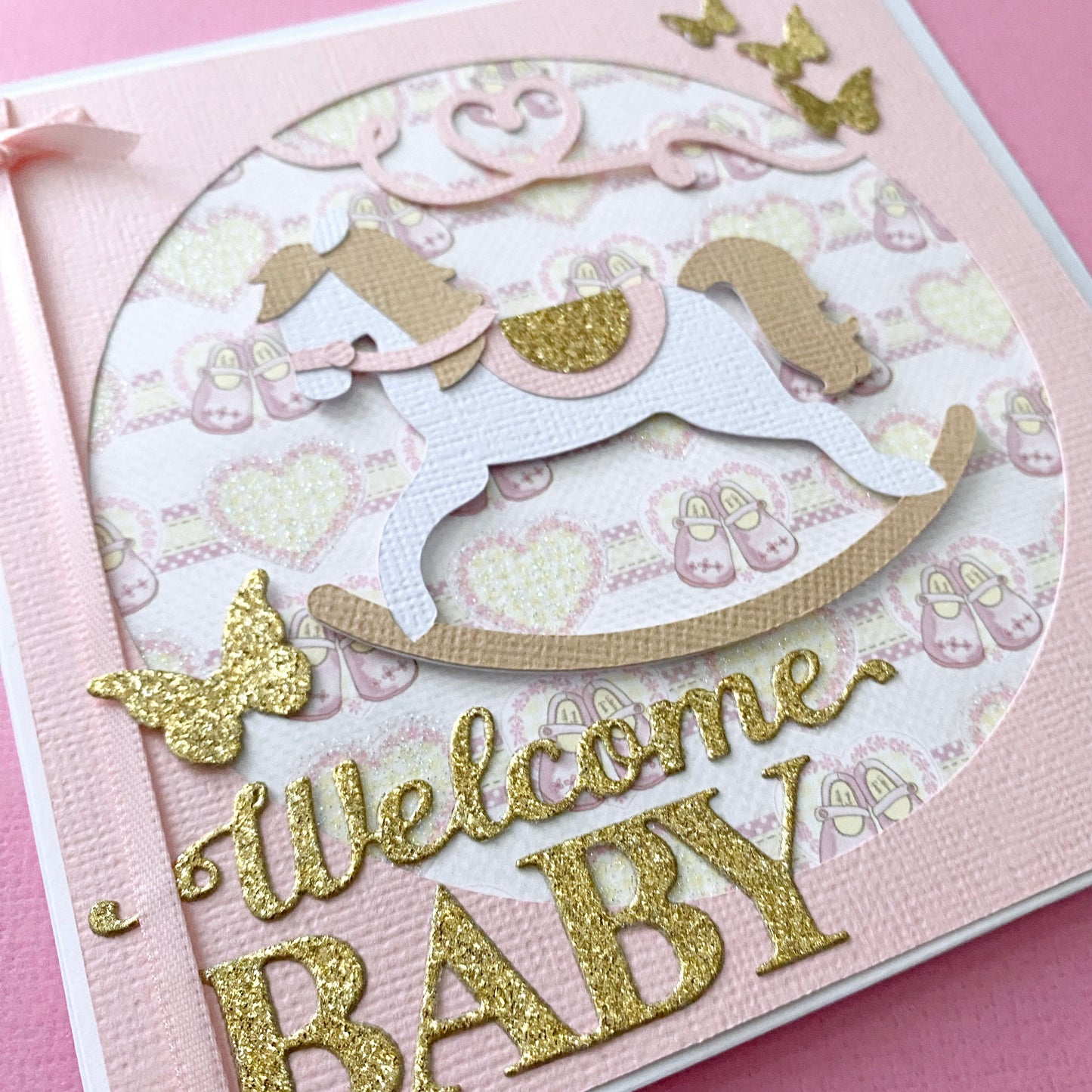 Rocking horse, new baby girl card. Welcome baby.