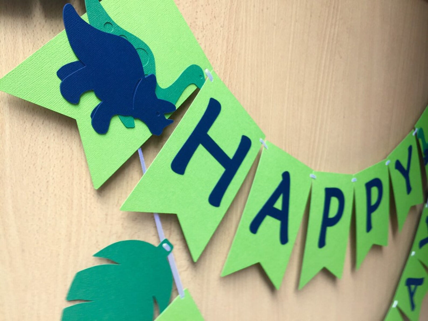 Dinosaur Happy Birthday party banner.