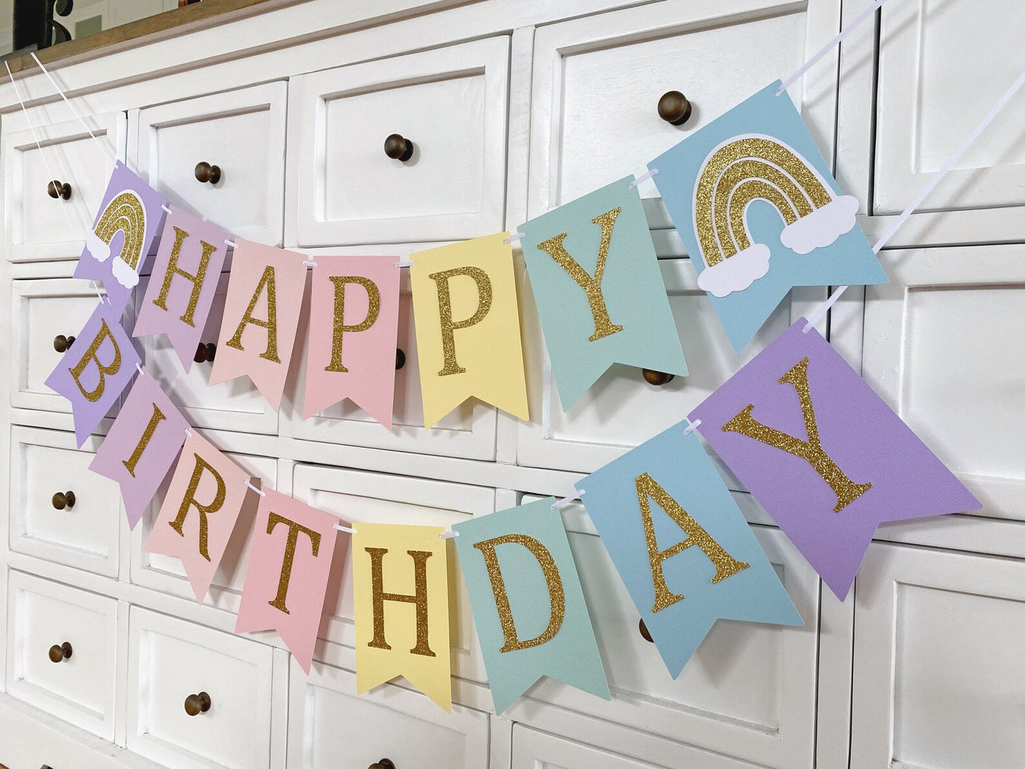 Pastel Rainbow Happy Birthday banner.