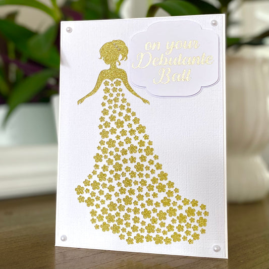 On your debutante ball, gold white debutante dress card.
