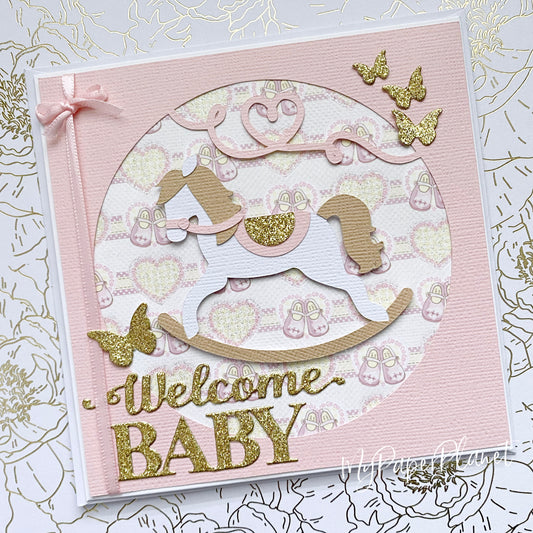 Rocking horse, new baby girl card. Welcome baby.