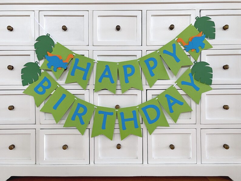 Dinosaur Happy Birthday party banner.